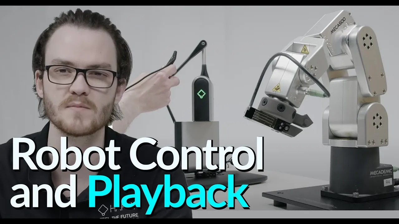 Inverse3 haptic controller beside a robotic arm in Haply's robotic control film