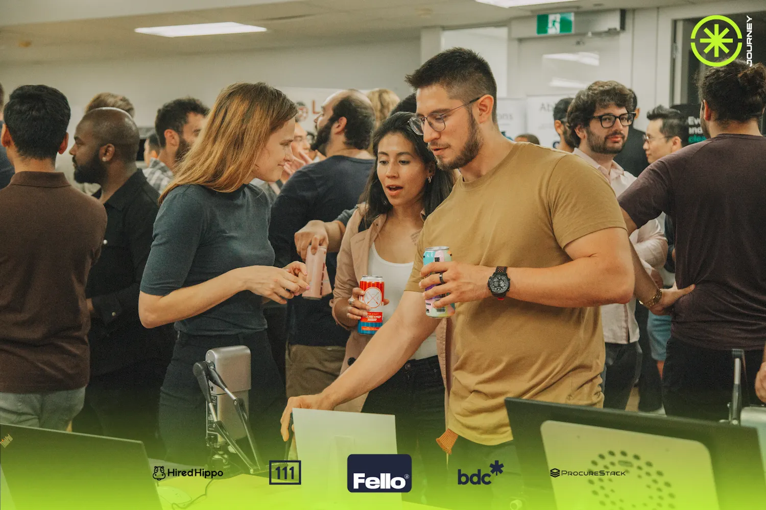 Attendees gathered around a Haply demo at a community showcase event
